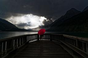 Lake Anterselva Silhouette red umbrella