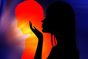 black female silhouette at hot colored male silhouette, love, drawing