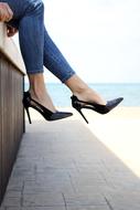 woman in black stilettos