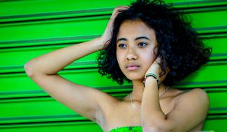 woman with black curly hair