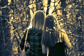 two girl best friends in the forest