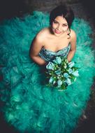 glamour woman in turquoise dress