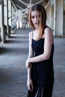 slim girl in black clothing