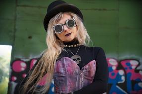 steampunk style Woman at colorful graffiti