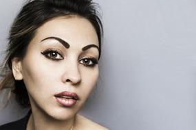 photo portrait of a beautiful young girl with makeup