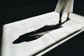 walking woman shadow