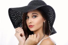 fashionable portrait of a woman in black hat