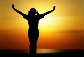 woman silhouette at sunset