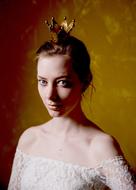 portrait of a girl with a golden crown on her head