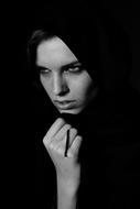 serious Woman in dark clothing, Black And White Portrait