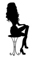 Black silhouette of the girl sitting on the chair at white background