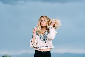 Beautiful Blond blue background