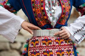 woman in bulgarian national costume close up