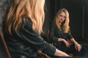 Lovely Girl reflected in the mirror