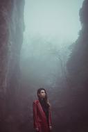 young Woman in foggy canyon