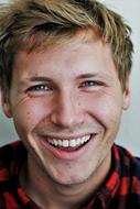 young caucasian man with wide Smile