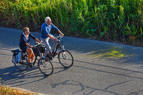 old couple cycling