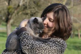 woman with grey cat