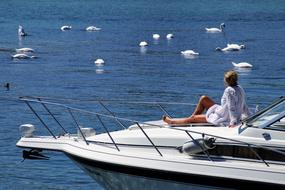 tanning woman on boat