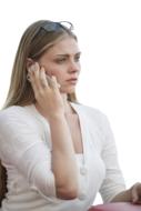Blonde woman in white clothing, with the glasses, talking on the phone