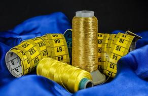 sewing threads and measuring tape