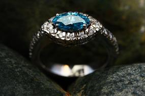 silver ring with blue diamond, close-up