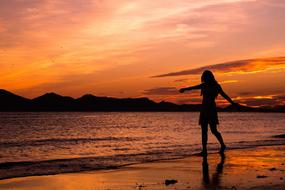 cheerful woman on the beach