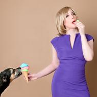 Dog and Woman eating Ice cream