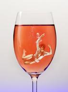 girl drowning in wine glass