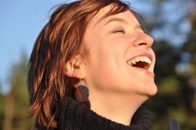 laughing beautiful woman on blurred background