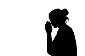 black silhouette of a praying woman on a white background