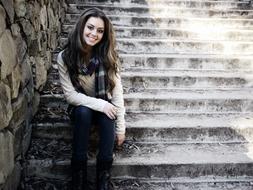 girl on the stone stairs posing