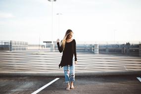 barefoot blonde woman