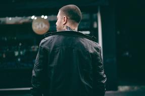 Man in back leather jacket