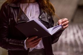 Girl reading education book