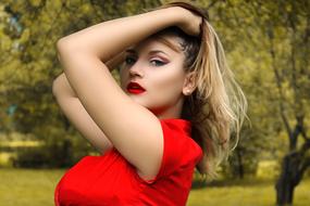 Summer garden and girl in red
