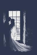silhouette groom bride photo