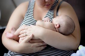 woman with cute little baby