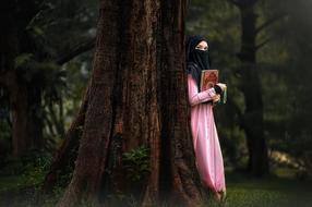 Muslim woman in pink dress