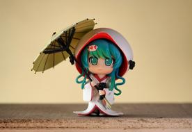 Young asian girl with umbrella, fiction character