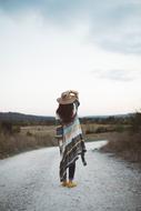 woman on gravel road in summer