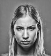 Black and white photo of the thoughtful blonde girl