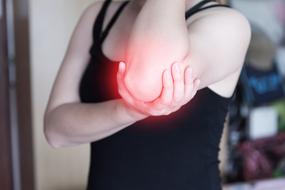 red elbow pain person