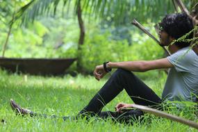 Boy in green garden