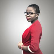 African woman with glasses and in red jacket