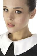 Beautiful Young Girl in black clothing with white collar