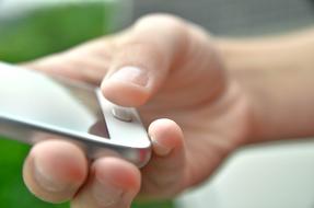 Close-up of the smartphone in female hand