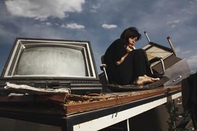 sad woman on the abandoned place