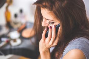 attractive woman talking on the smartphone