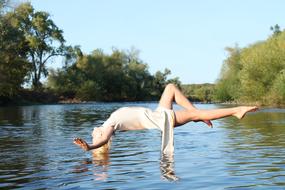levitation, girl over the lake